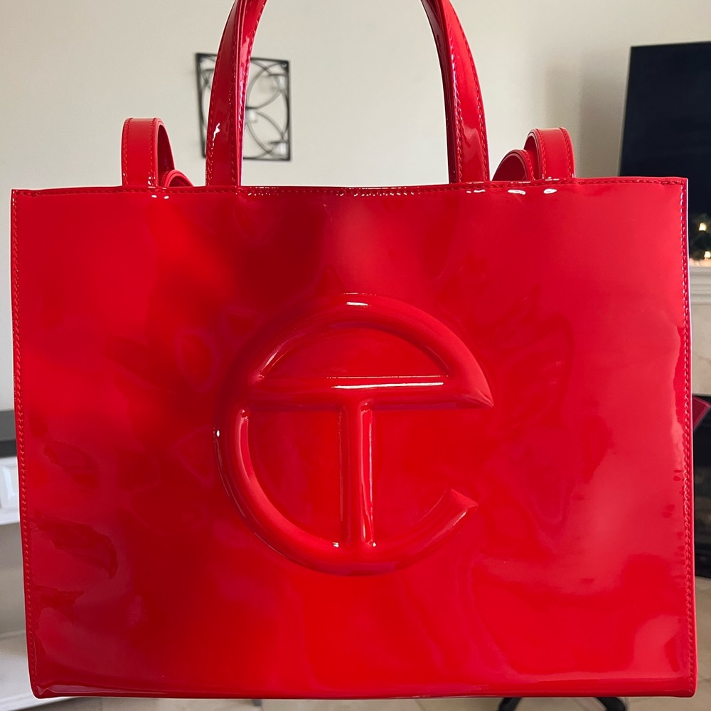 Brand new red patent leather Telfar bag. Not even a month old.